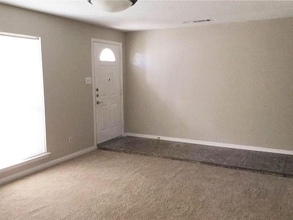 Inside front door, dining square shaped room