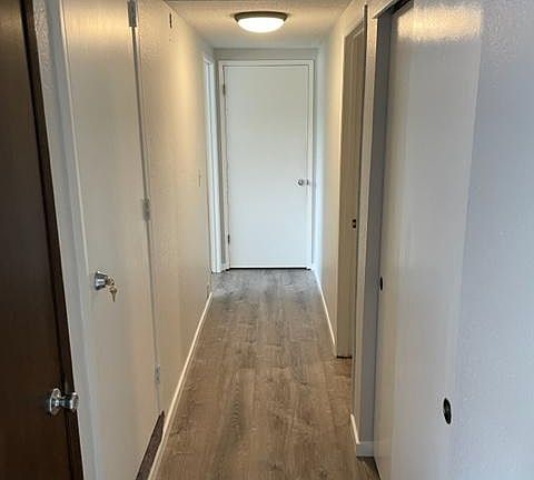 Hallway to bedrooms and family room