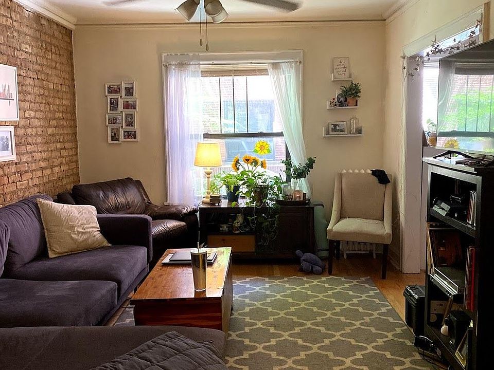 Living room with exposed brick wall
