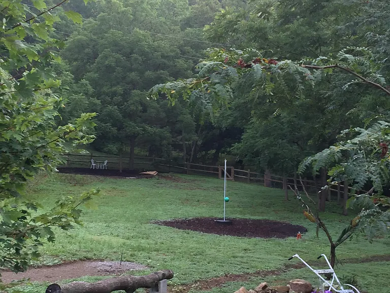 back sitting area and tetherball playing area