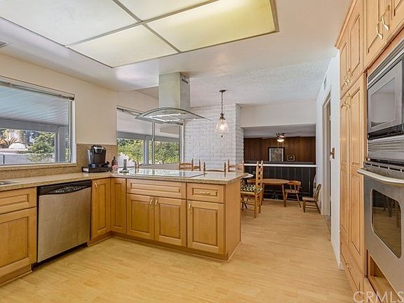 Kitchen with Granite Counters and Beautiful Cabinets