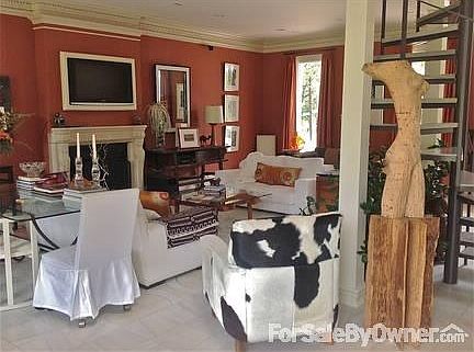 Living Room
						:
						beautiful plaster molding, stone fireplace mantel, large spiral staircase.