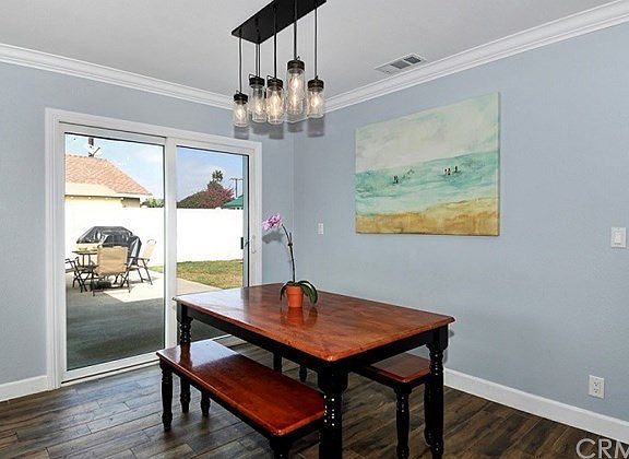 Dining area with access to backyard.