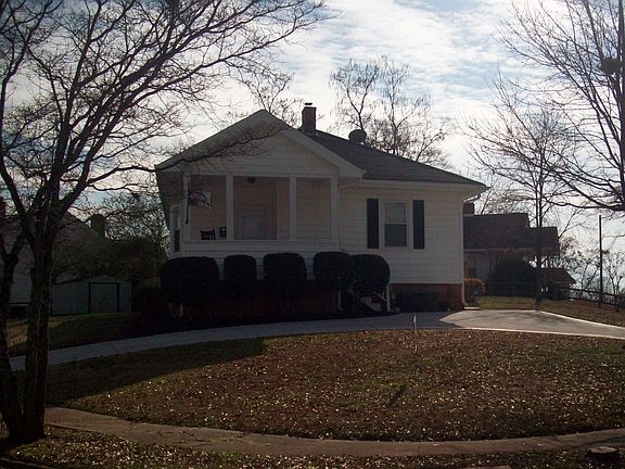 Concrete Driveway with access to both streets