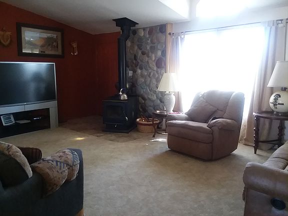 Woodstove, natural riverrock