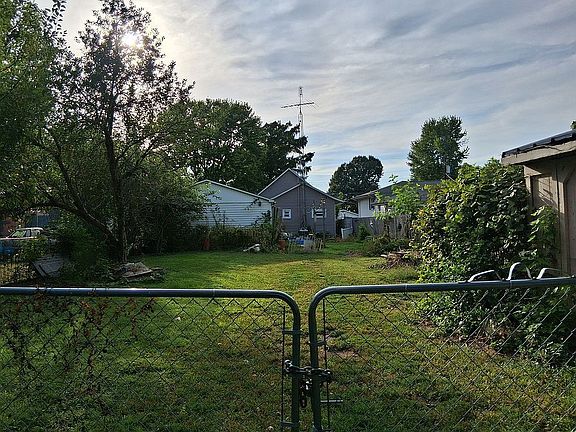 View from alley of backyard.