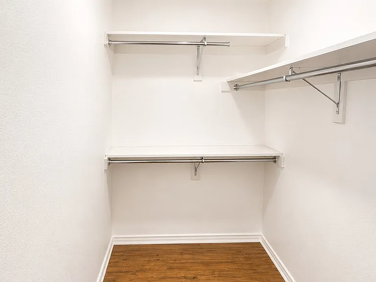 Walk-in closet with custom shelving