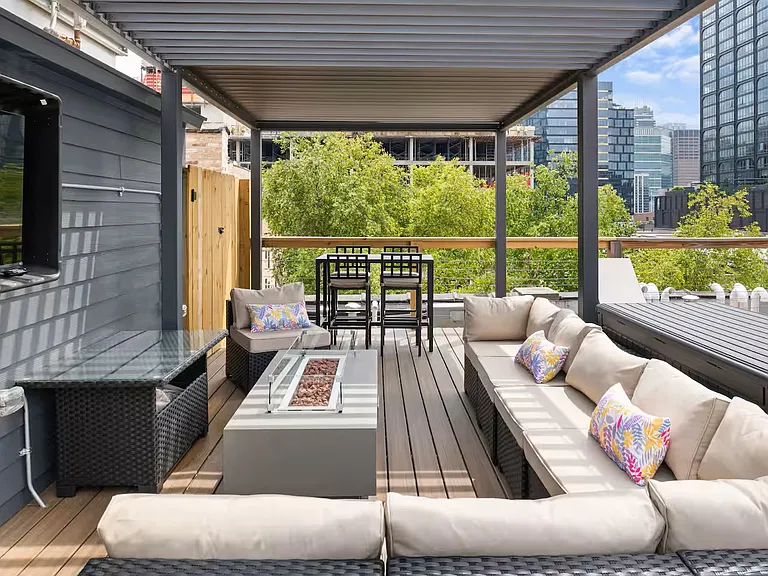 Roof Deck seating area. Fire pit and TV.
