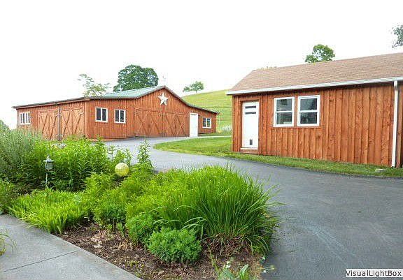 As you head up the driveway - the small building was the original springhouse 