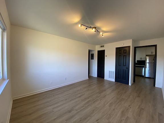 Living room, facing kitchen