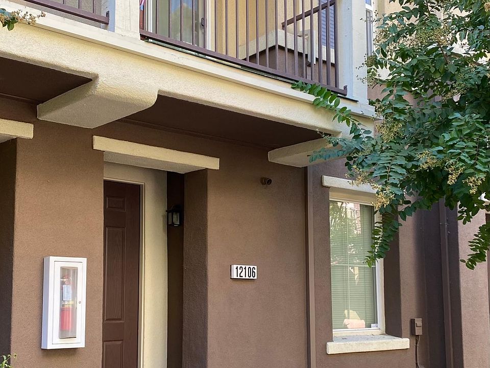 Front entry and balcony off of living room.