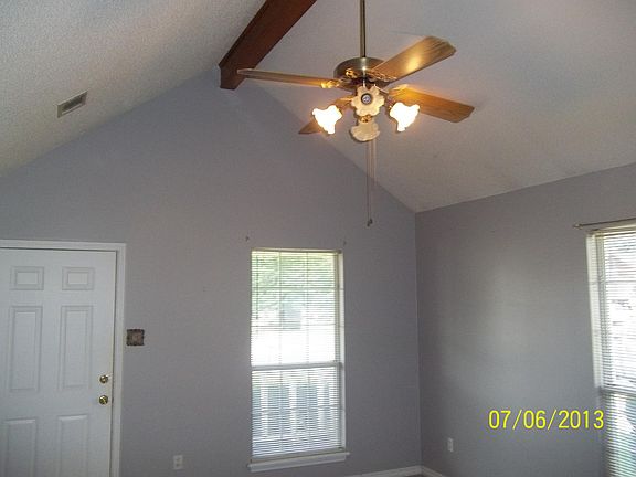 living room with high ceiling
