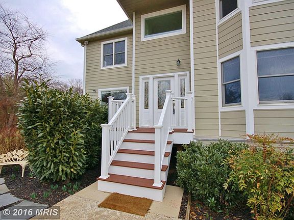 Front Porch with gorgeous landscaping