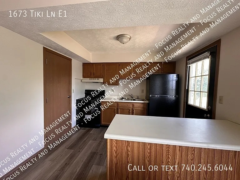 1673 Tiki Ln #E1 — Photo 3