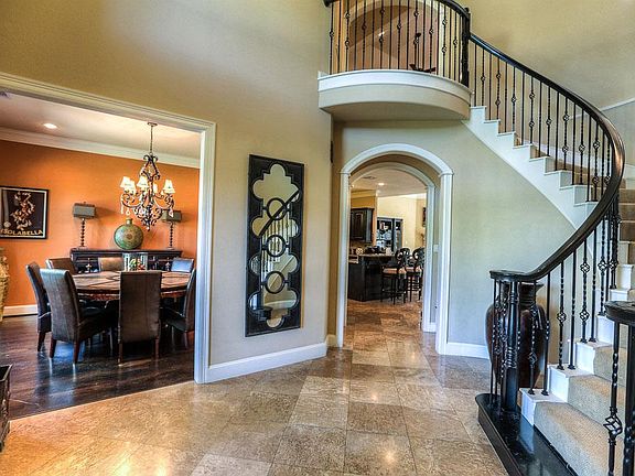 Travertine flooring and lots of extra features makes your home a show place for entertainment.