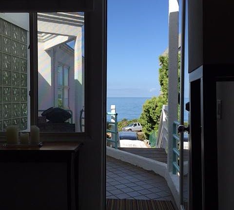 View of ocean while sitting inside