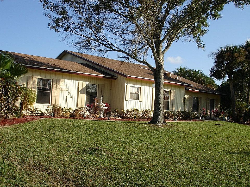 This very unique one of a kind home is priced to sale.  Sits on 1.8 acre pool 3/2 plus loft and mother in law qtrs. Room for expansion.  Wrap around patio surround sound in and out.  Priced to sale.