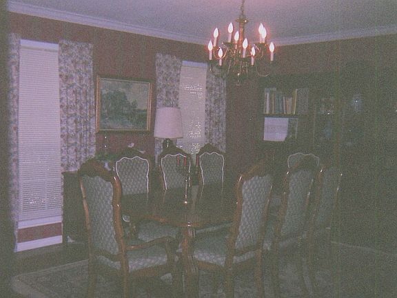 Large Dinning Room seats 12 plus buffet and bookcase