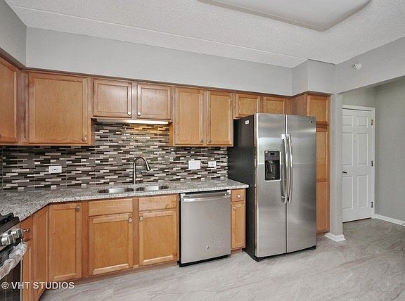 5th image of 7400 Lincoln Ave Unit 311