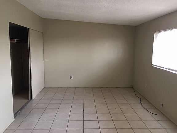 Bedroom with sliding door closet