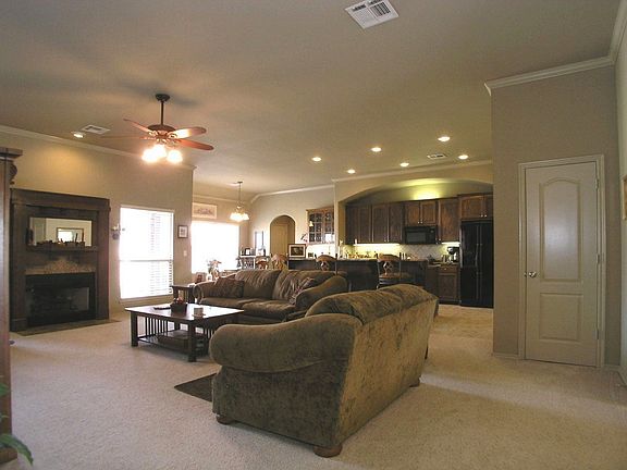 Large open family room w/wood burning fireplace