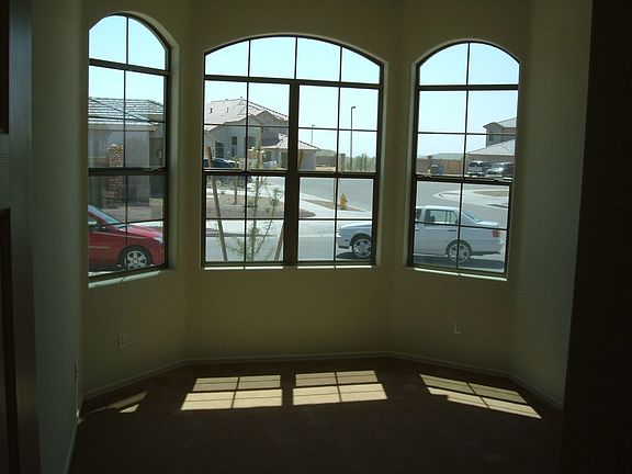 bay in front room and in master bedrm