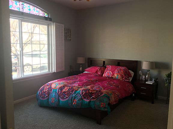 Master bedroom with large window