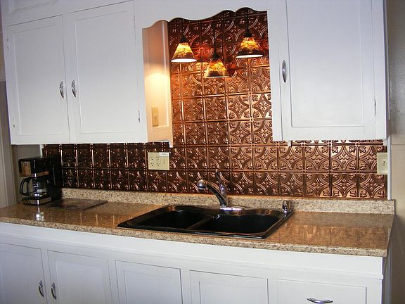 The kitchen looking right as you enter.