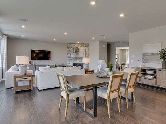 Spacious Gathering Room and Cafe with Hardwood Flooring