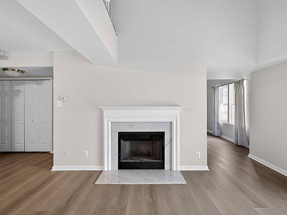 Wood burning Fireplace with marble surround & traditional mantle. So pretty!
