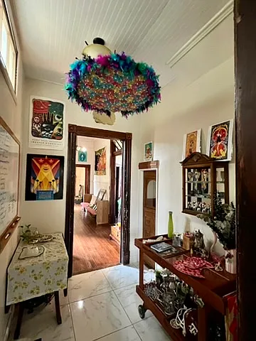 Transition between kitchen and front hallway/entrance, older pic