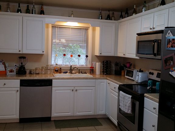 Updated kitchen with new cabinets, counters and floors