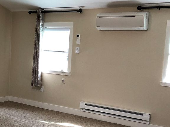 Separate ductless mini-split AC in both dining and bedroom areas.
