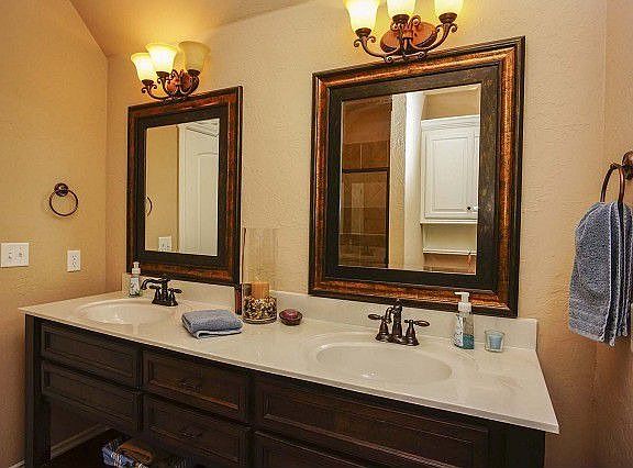 Bathroom has two sinks