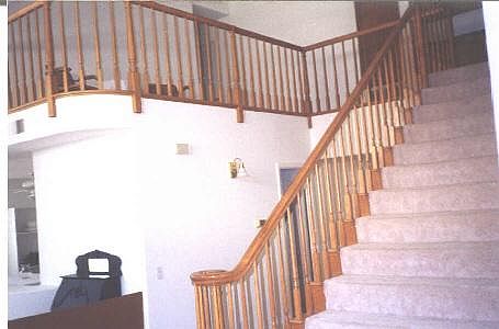Stairway up to large bonus loft area