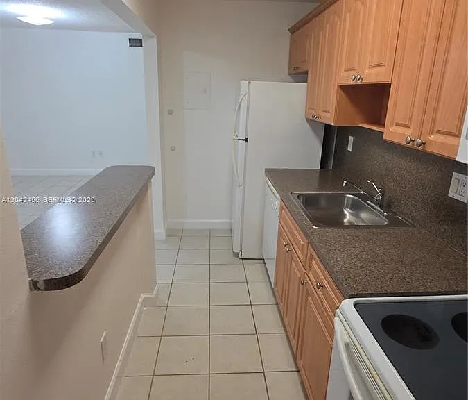 5839 SW 74th Ter #203 — Photo 7