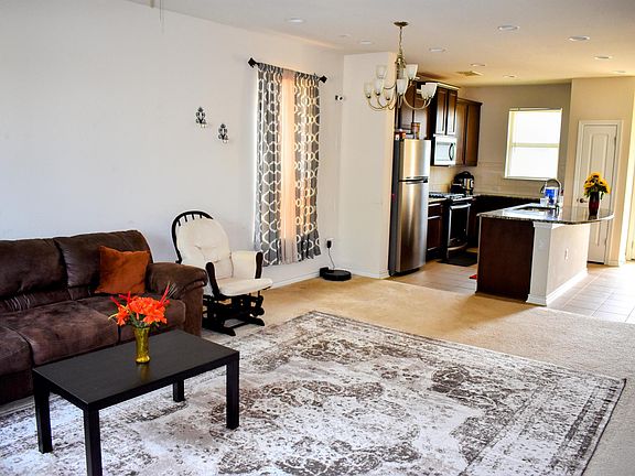 Living room, dining and kitchen