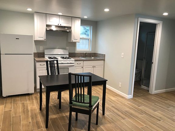 Gas range and refrigerator