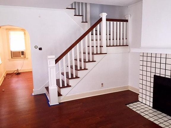 Stairs lead to upstairs with two big bedrooms