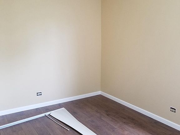 2nd bedroom on May 10.  Walls just painted!