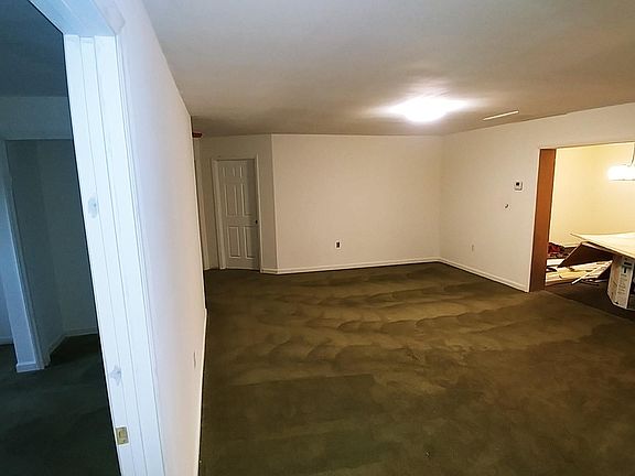 A HUGE living room, perfect for flat-screen surround sound, pool table and seating for +25 of your family & friends. PLENTY of outlets, storage & space for everyone.