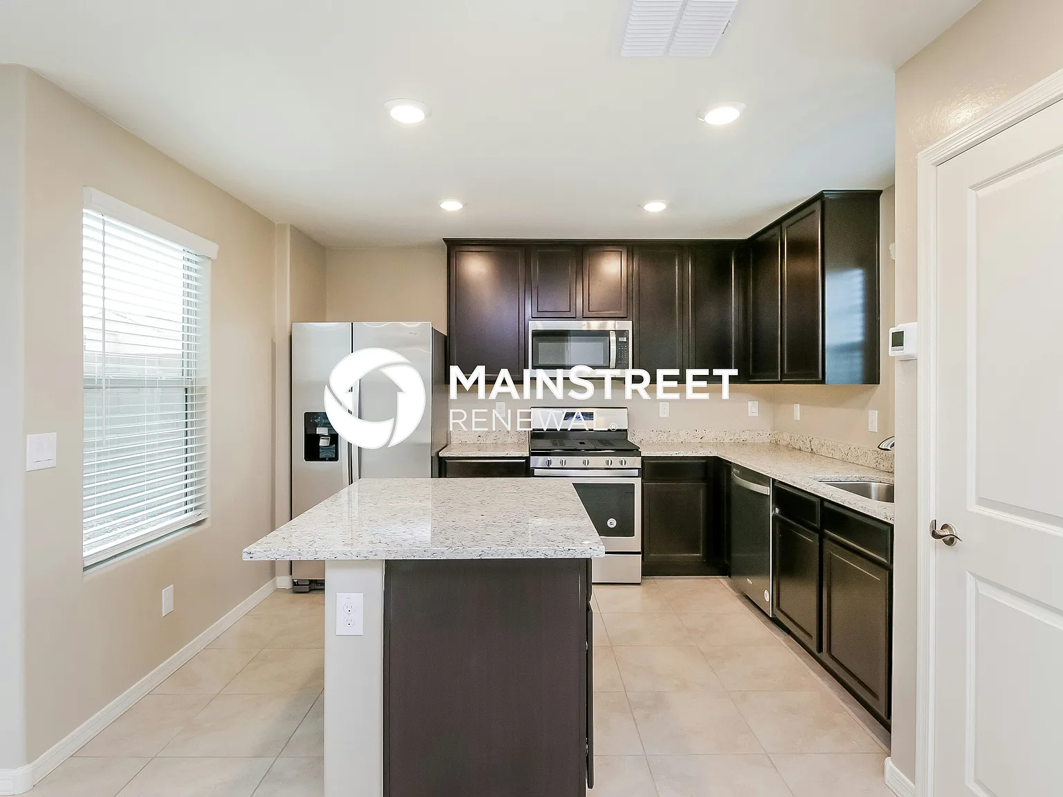 8241 W Albeniz Pl — Photo 4