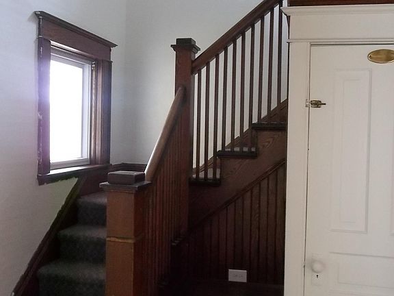 Entryway and door to the basement