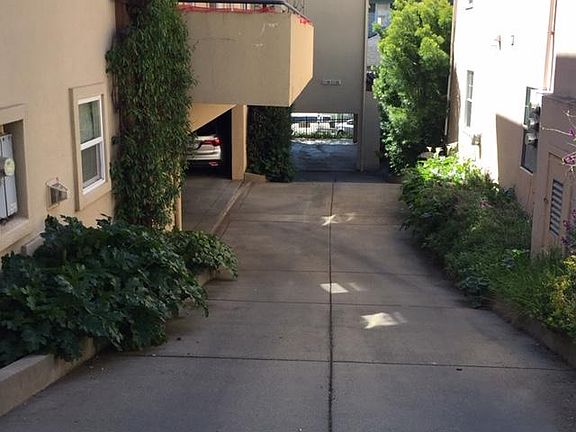 Driveway under deck to Parking Garage