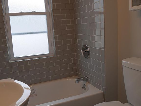 Bathroom window frosted for privacy.