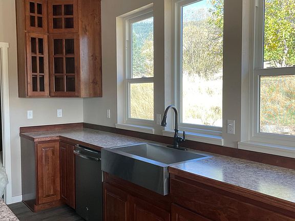 Kitchen has a lot of counter top space and built in storage.