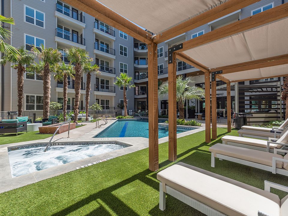 Sparkling Pool with Outdoor Covered Lounge Areas