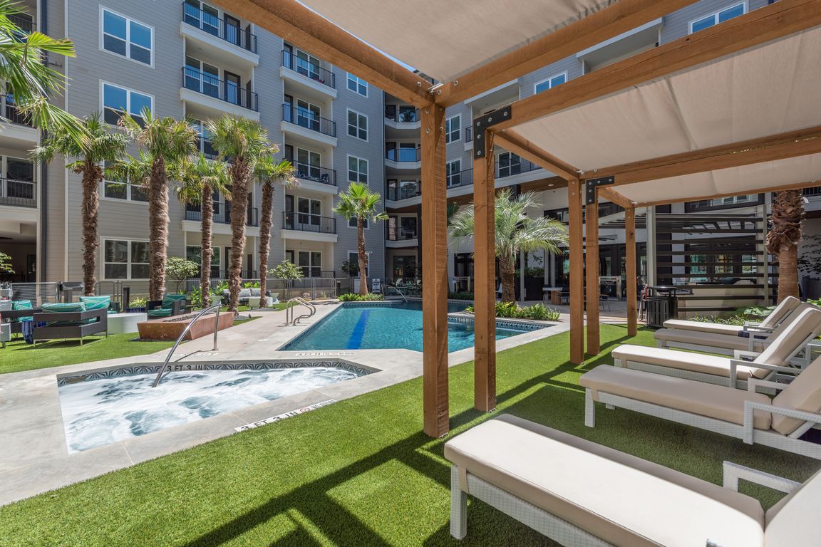 Sparkling Pool with Outdoor Covered Lounge Areas