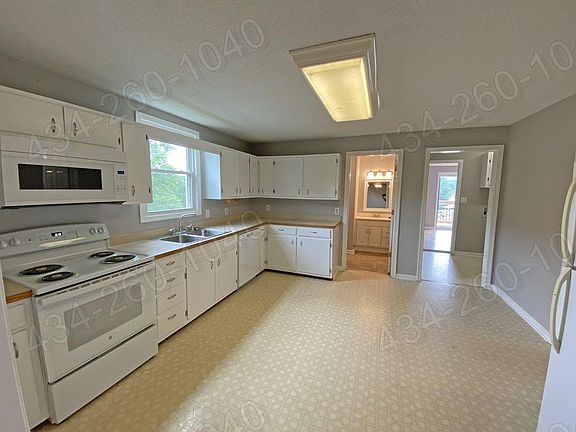 Great Kitchen with lots of Cabinets and Eat in Dining Area - Dishwasher, Range, Microwave, and Refrigerator Included