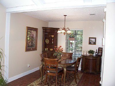Dining area is open to the living area.  Window display a plus.